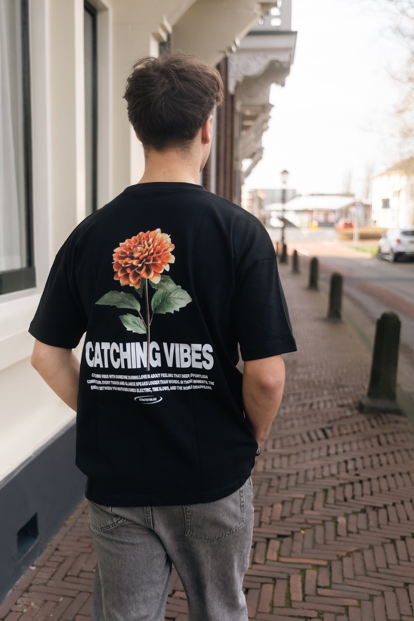 La camiseta extragrande Catching Vibes